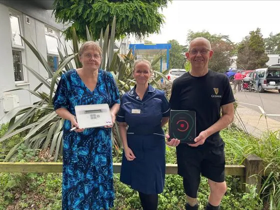 Sue and Colin Pearce with Ali Devlin, F7 ward manager
