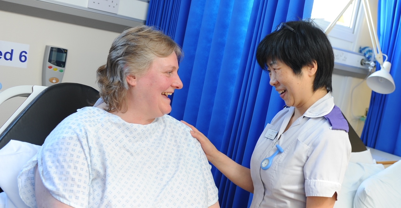 A Trust member of staff with a patient
