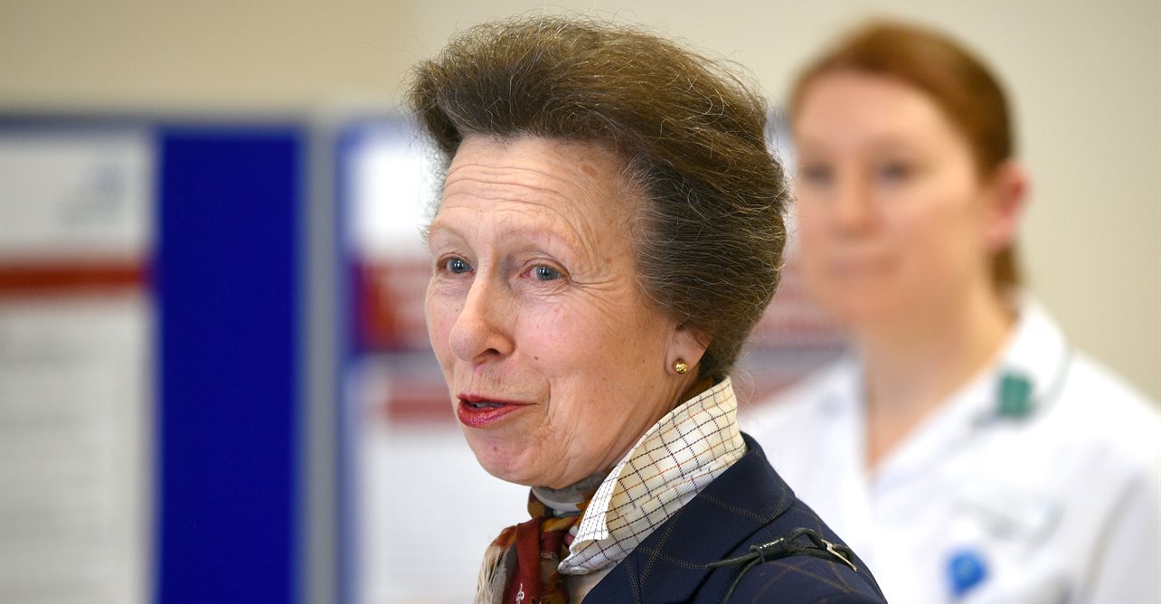 HRH The Princess Royal, speaks to occupational therapists and patient during her visit. 