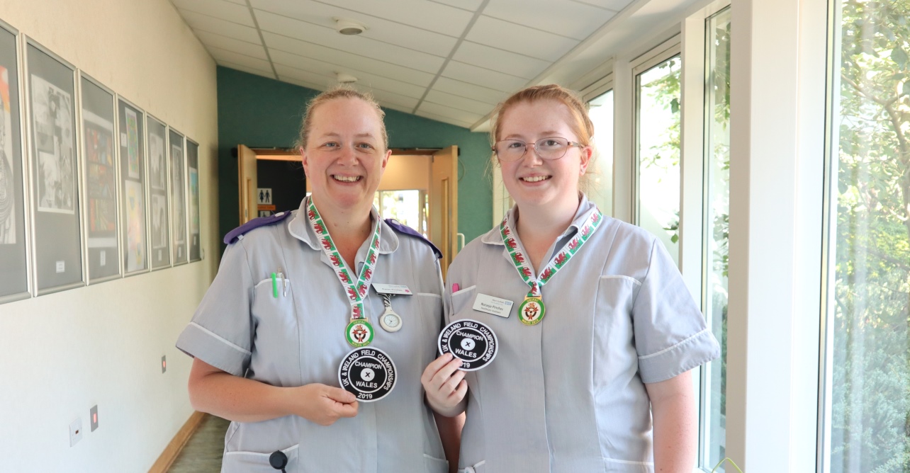 Left to right: Karen and Natasja Pinches with their field archery medals from Wales, ready to compete in the European Championships.